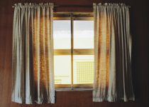 prevent curtain rod sliding