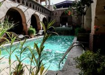 natural backyard stone oasis