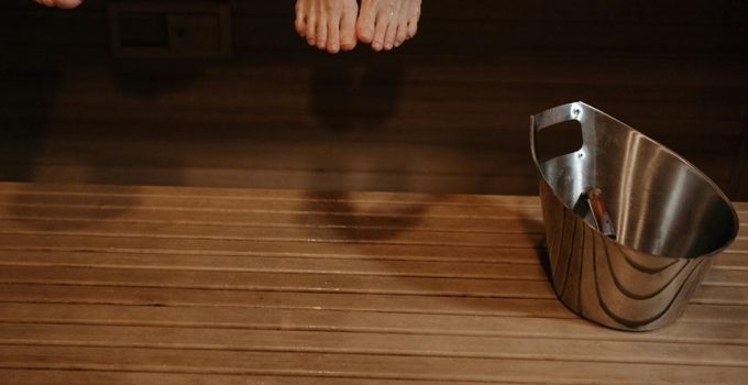 install outdoor shower footrest